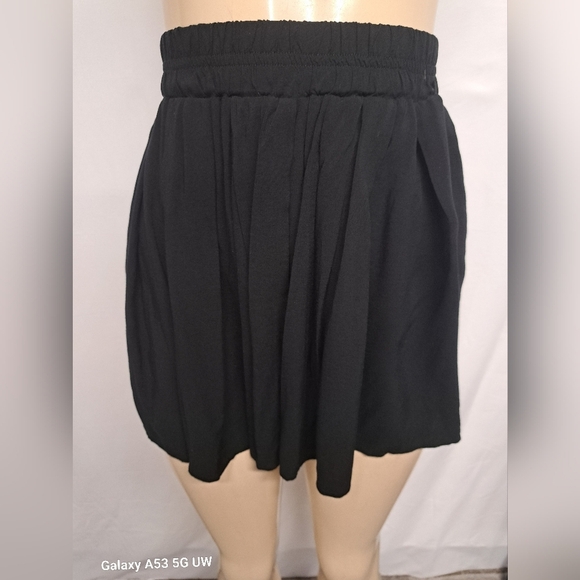 Brandy Melville Black Swing Flowy Mini Skirt Elastic Waist Pleated S M - Picture 2 of 6
